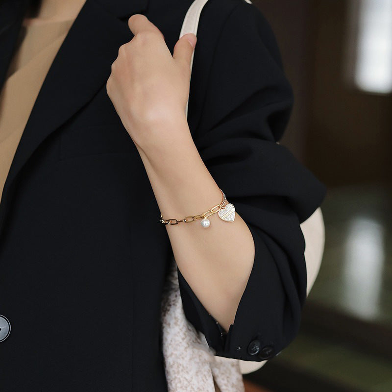 Buy Online Premimum Quality, Trendy and Highly Comfortable Fashion Trendy Design Pearl Diamond Love Bracelet - FEYONAS
