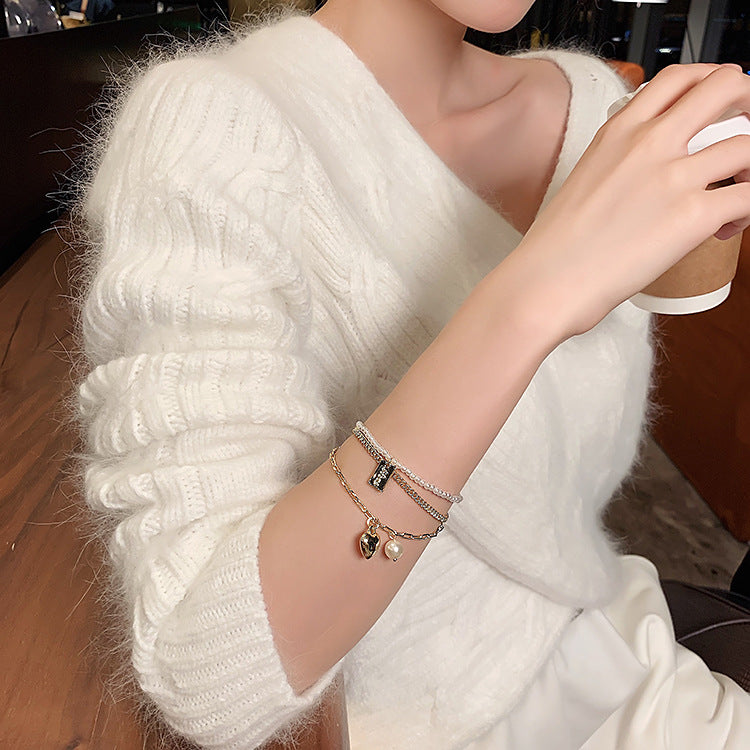 Buy Online Premimum Quality, Trendy and Highly Comfortable Pearl Multilayer Love Bracelet - FEYONAS