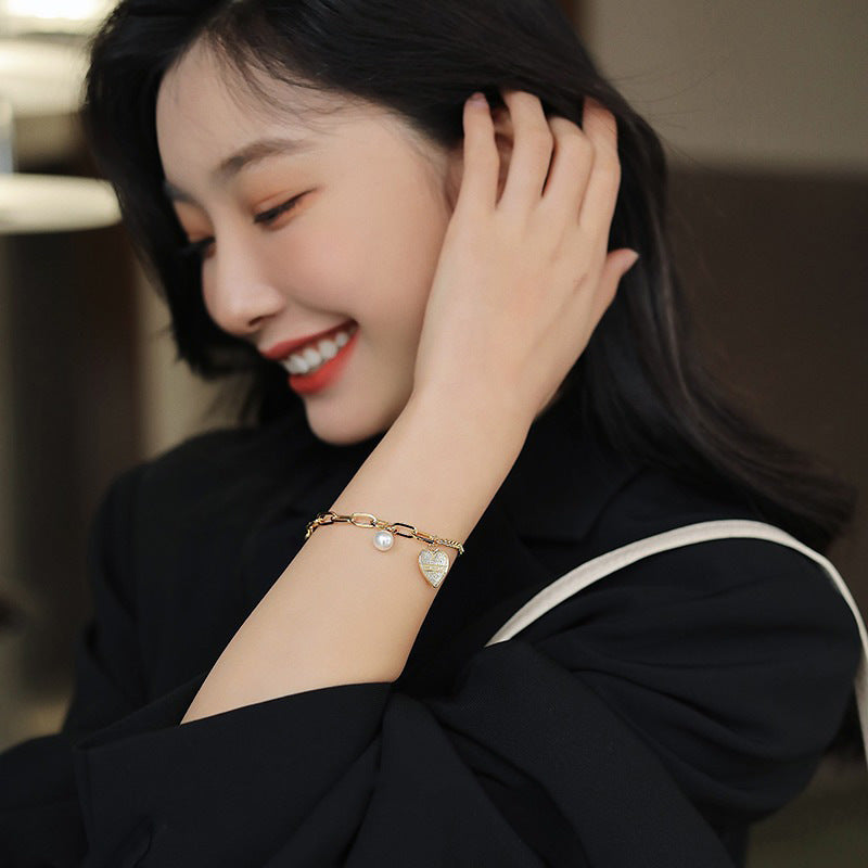 Buy Online Premimum Quality, Trendy and Highly Comfortable Fashion Trendy Design Pearl Diamond Love Bracelet - FEYONAS